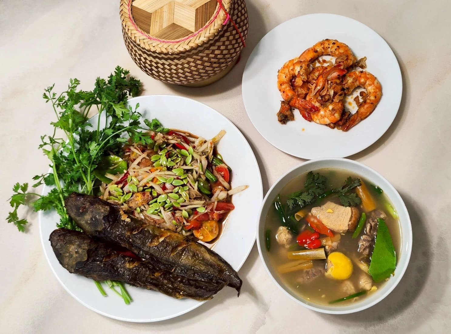 สำรับอีสานนัวนัว — Nua Nua Isan Feast